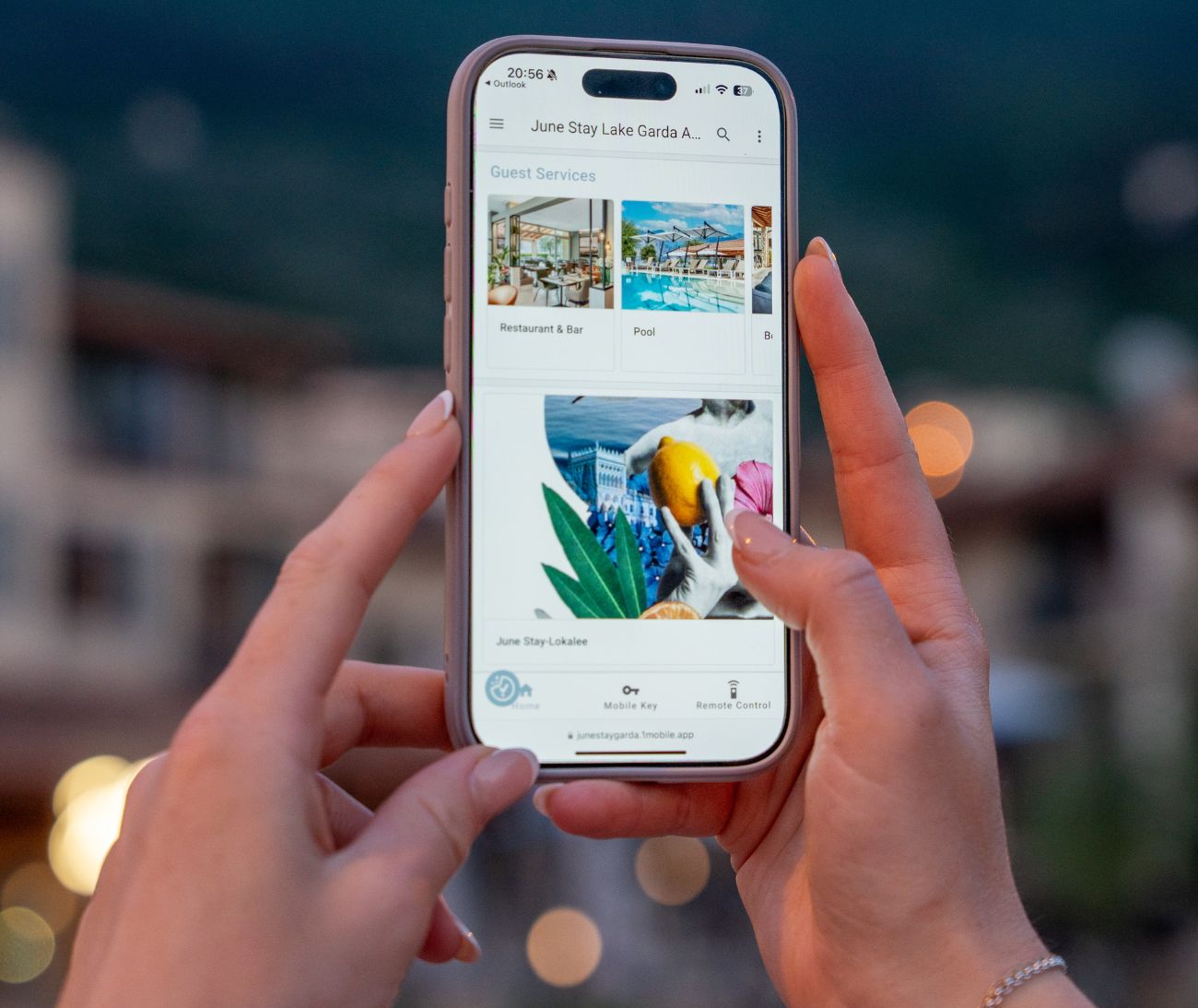 A guest browsing the hotel's guest-services menu on their own phone