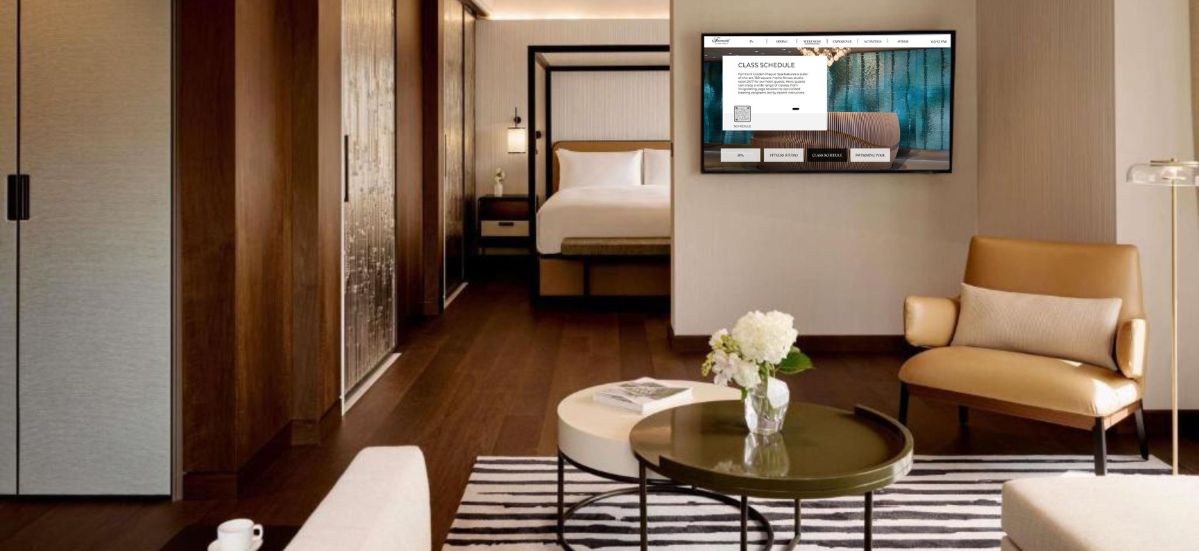 A Fairmont Golden Prague suite with a large wall-mounted TV