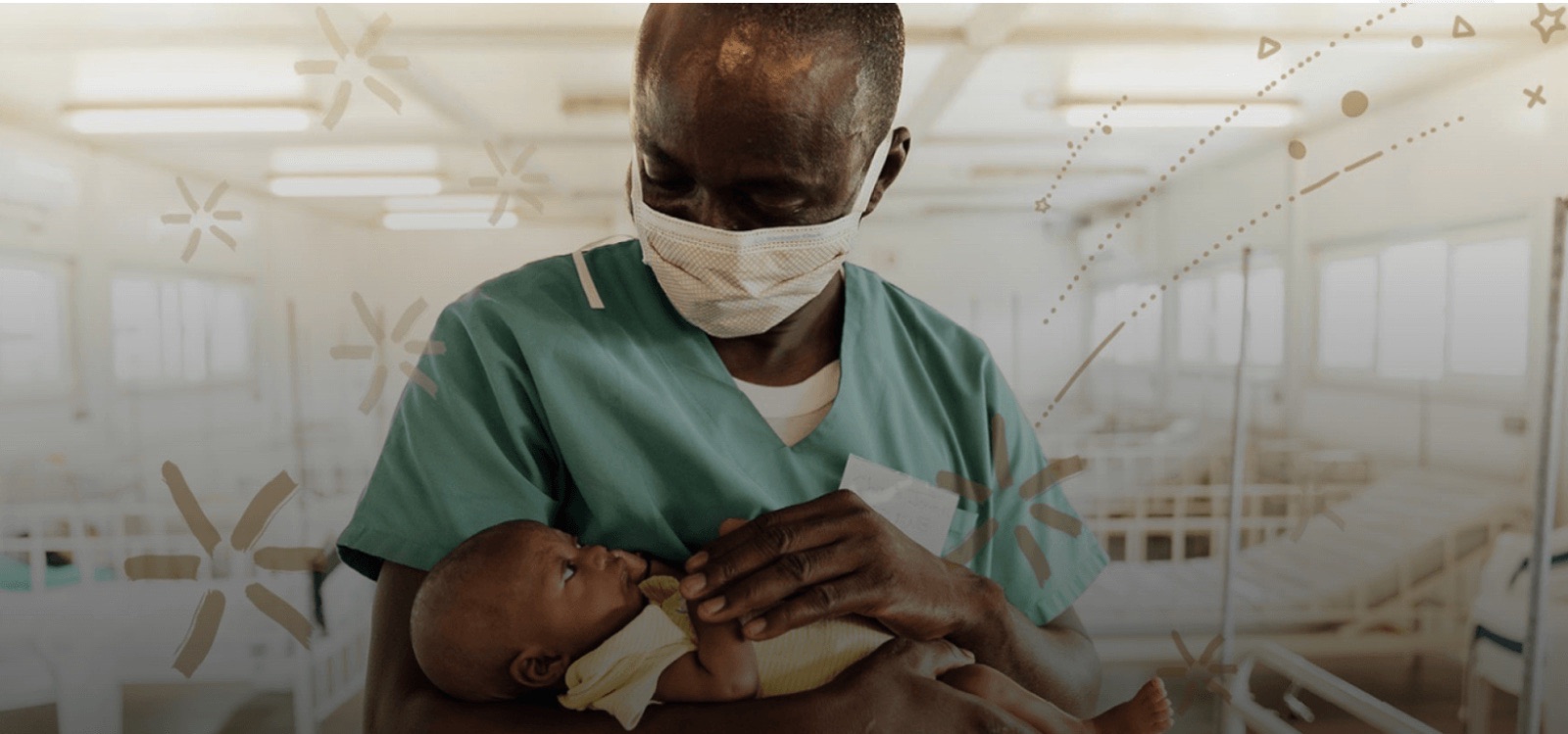 A masked nurse cradling a young child in a care ward, with decorative gold accents