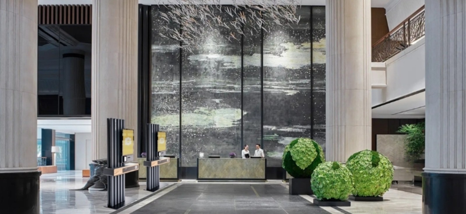 The Shangri-La Singapore lobby with at-visions self-check-in kiosk