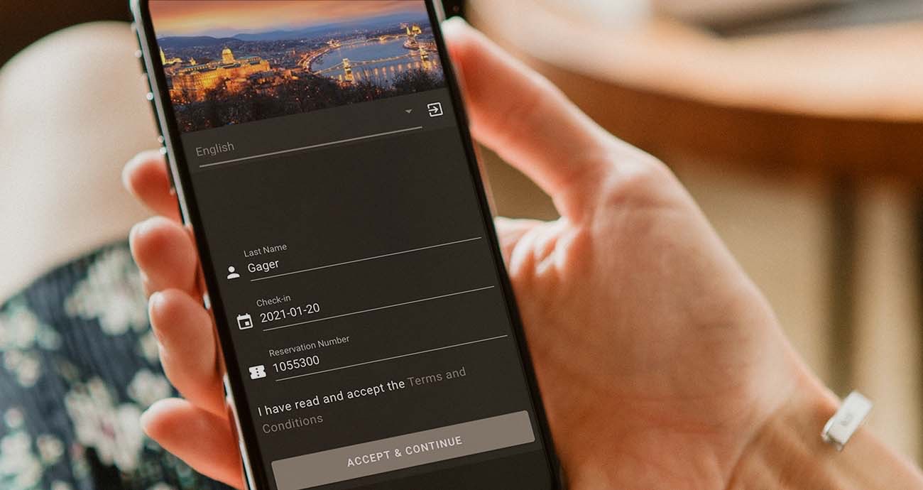 Guest-journey diagram: kiosk or mobile check-in, passport and facial recognition, then room key