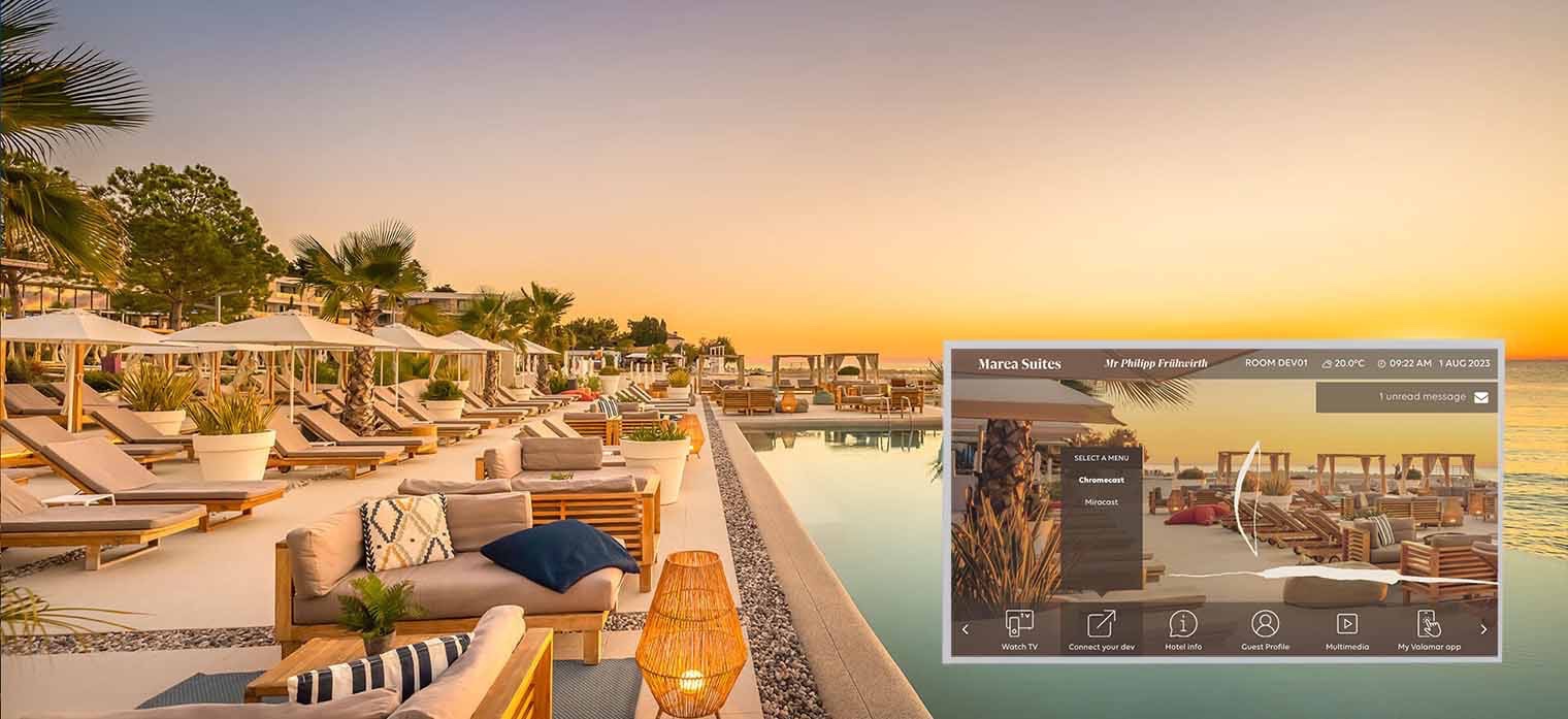 The Valamar Marea Suites poolside at sunset with the in-room TV interface